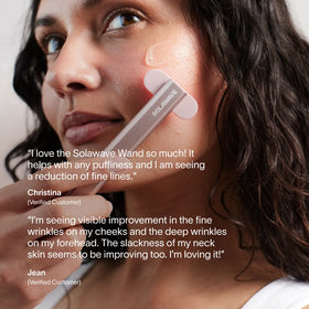 A woman uses the Solawave 4-in-1 Red Light Therapy Wand & Activating Serum Kit on her cheek, while glowing customer reviews about its effect on fine lines, dark spots, puffiness, and skin improvement appear in white text.|| Rose Gold